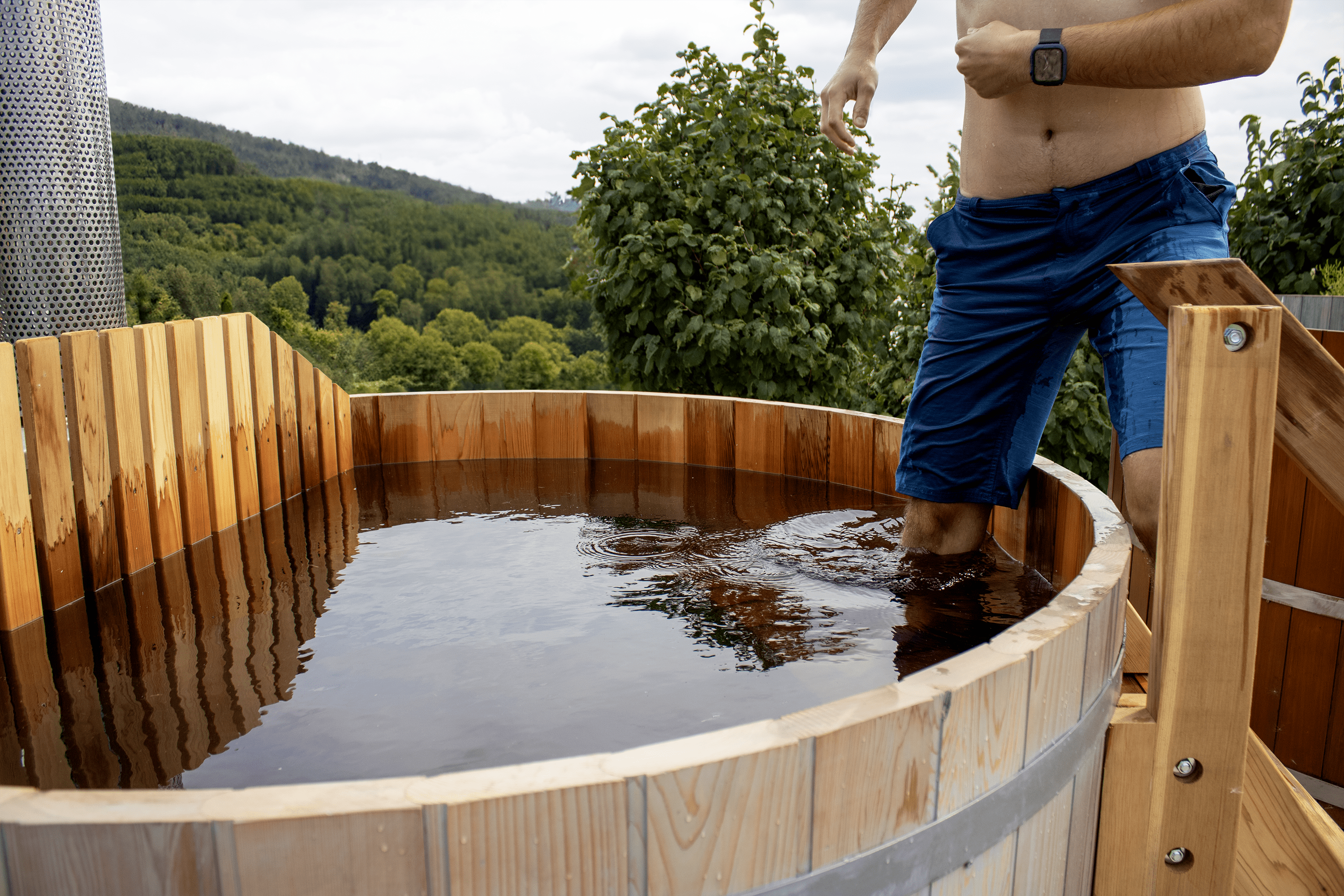 Entering a wood fired hot tub